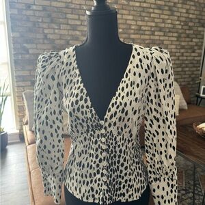 Reformation - flattering fitted puff sleeve top. Gorgeous!